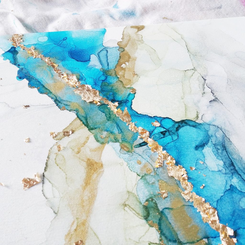 turquoise and gold abstract painting